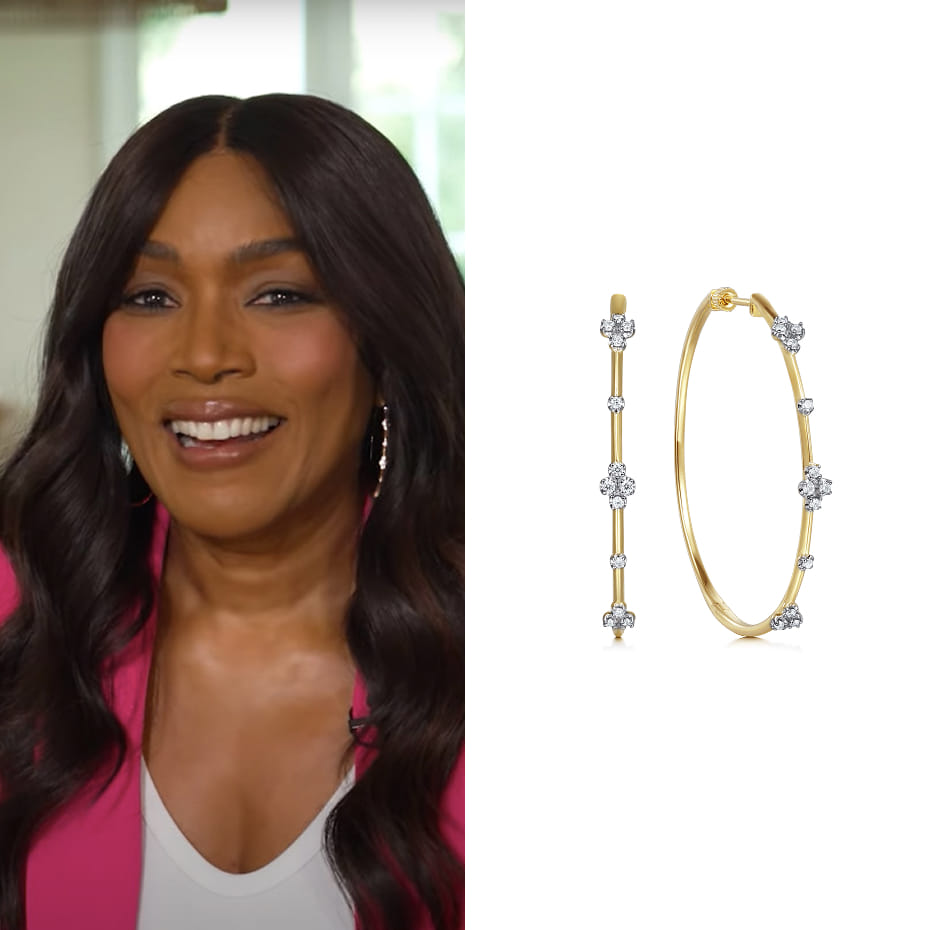 Actress Angela Bassett hosted Redefining Aging with Senior Athletes, a TV special by GSK, wearing Gabriel & Co. diamond hoop earrings in 14K Yellow Gold.