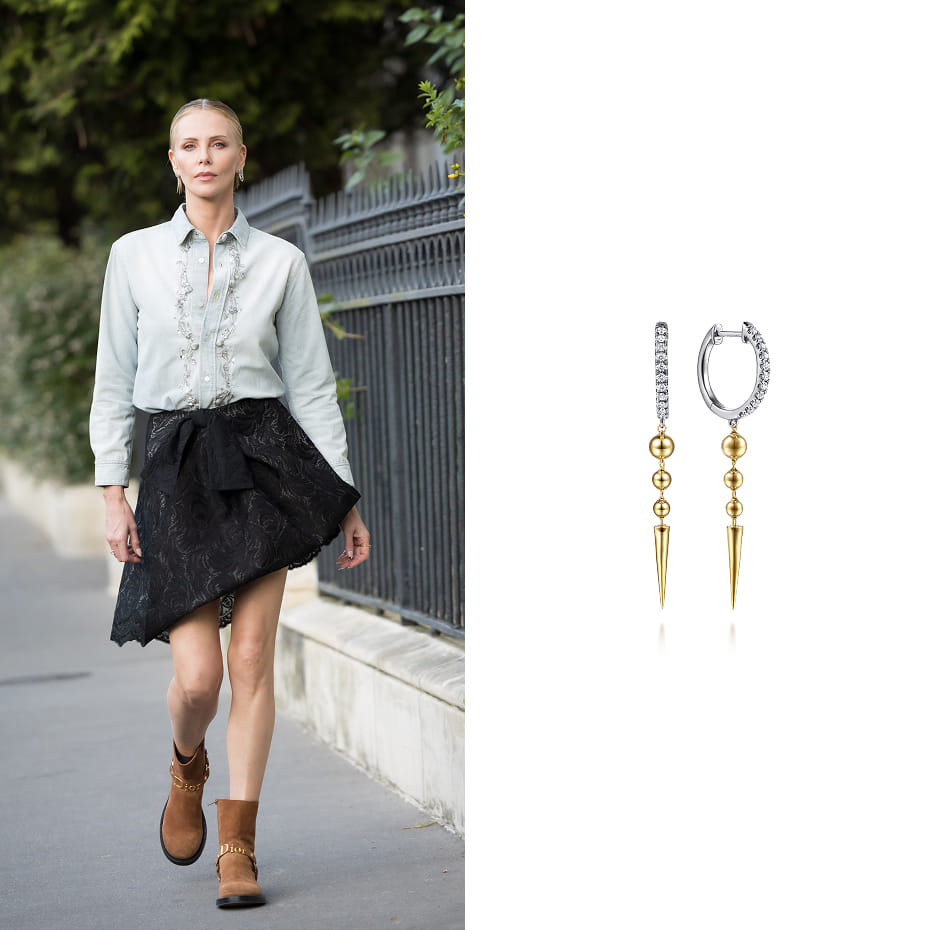 Charlize Theron was out in Paris wearing Gabriel & Co. Bujukan Punk diamond huggie drop earrings in mixed gold.