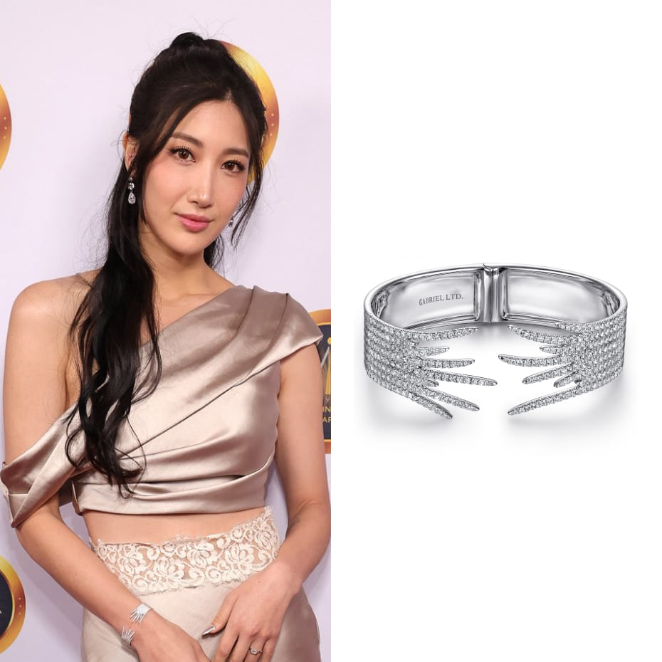 EJAE attended the 16th Annual Hollywood Music In Media Awards, wearing a Gabriel & Co. Split 18K White Gold Fan Diamond Bangle.