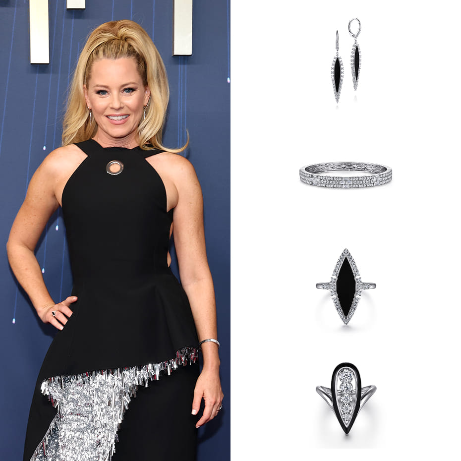Actress, Elizabeth Banks attended the 77th Primetime Emmy Awards wearing Gabriel & Co. diamond earrings, rings, and a bangle in 14K White Gold.