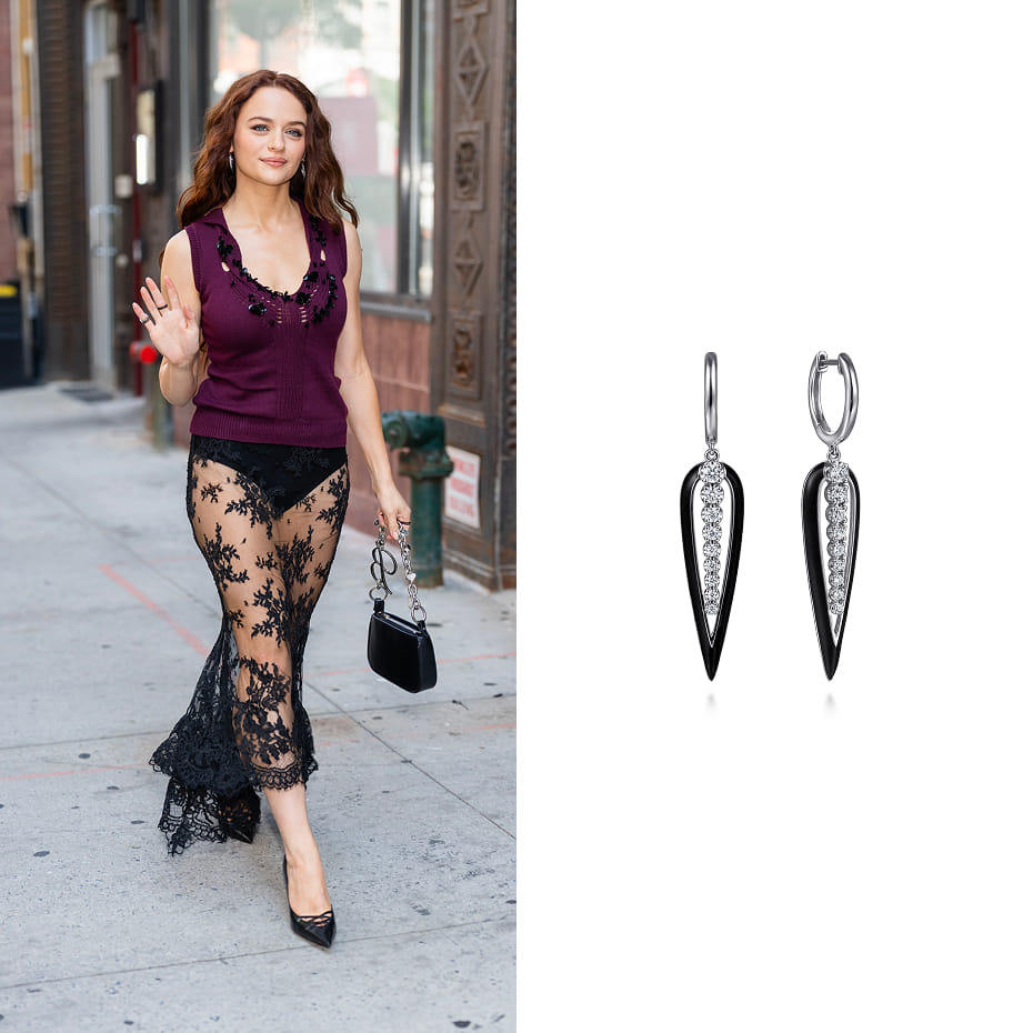 Joey King wore Gabriel & Co.'s 14K White Gold Graduating Diamond Huggie Drop Earrings with Black Enamel while promoting Practical Magic 2 in NYC.