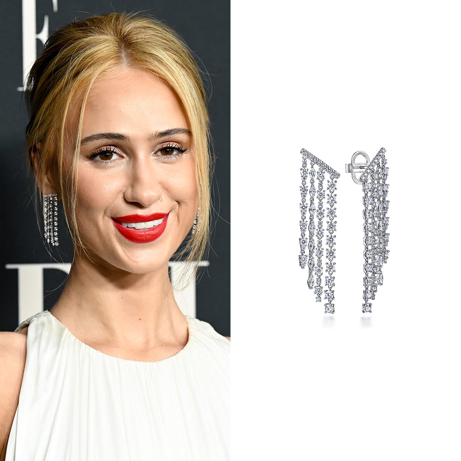 Actress Maria Bakalova attended the 2025 ELLE Women in Hollywood Celebration wearing Gabriel & Co. diamond drop earrings in 18K White Gold.