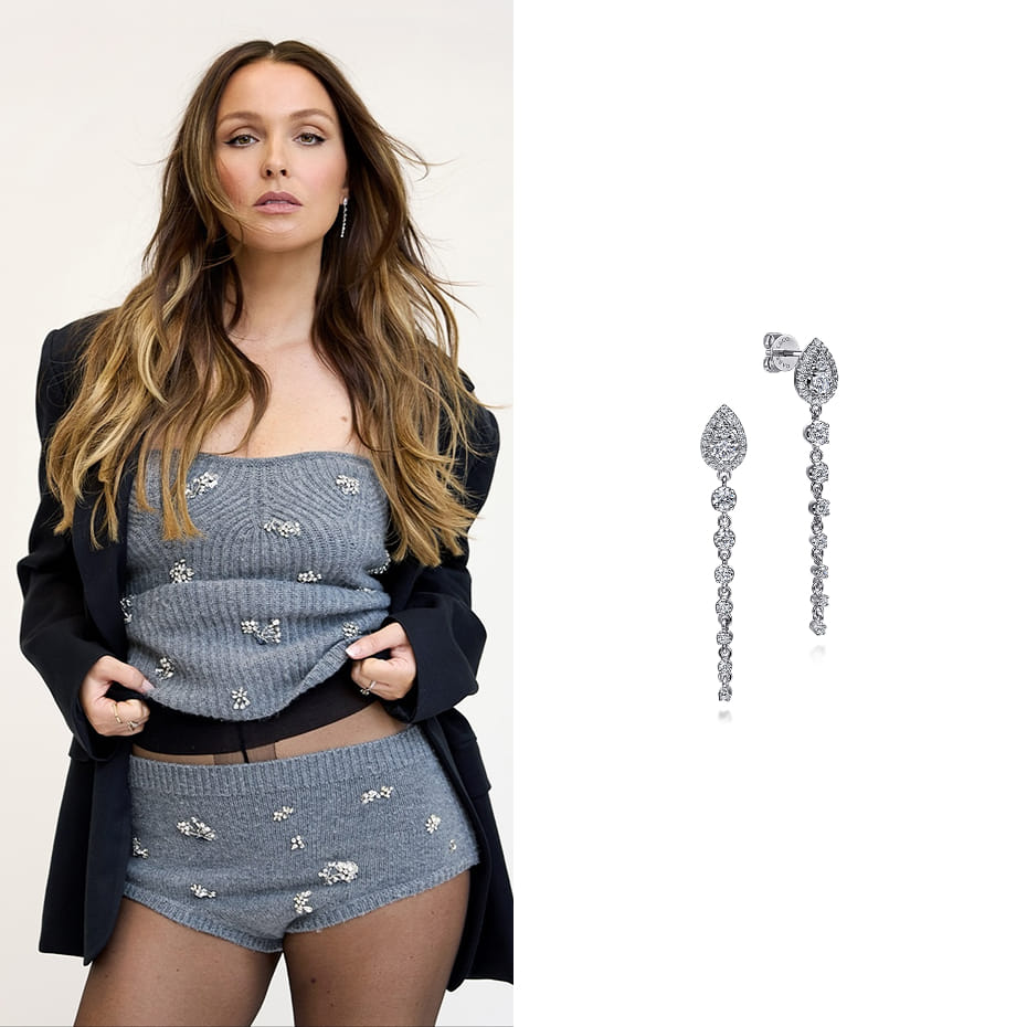 Actress Camilla Luddington wore Gabriel & Co. 14K White Gold Graduating Diamond Stud Drop Earrings on Bustle.com for the story, 