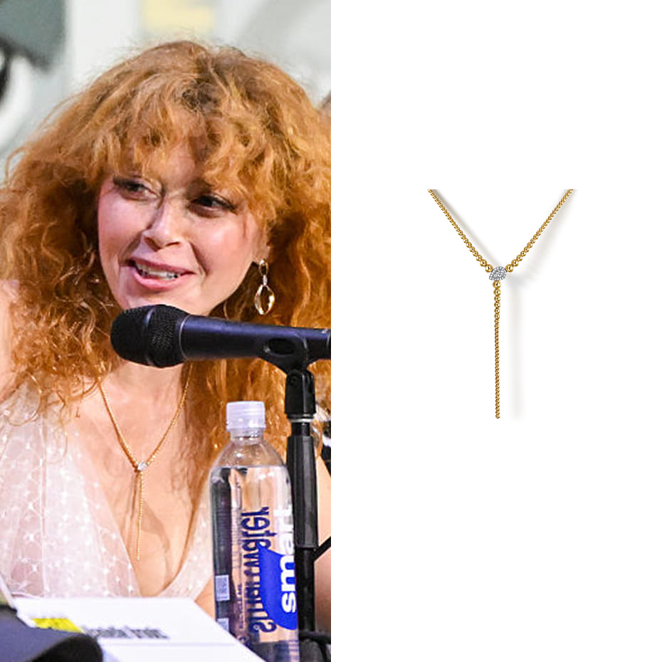 Actress Natasha Lyonne spoke on DreamWorks Animation's The Bad Guys 2 panel at the 2025 Comic-Con International: San Diego, wearing the Gabriel & Co. 14K White and Yellow Gold Bujukan Beads and Diamond Y Necklace.