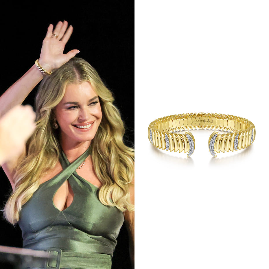 Rebecca Romijn wore Gabriel & Co.'s 14K Yellow Gold Crescent Moon Open Cuff Bracelet with Diamond Pavé Stations at the Star Trek: Strange New Worlds panel during 2026 Comic-Con International: San Diego.