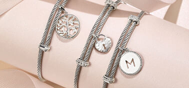8 Silver Charm Bracelets That Are Chic and Easy on the Pocket